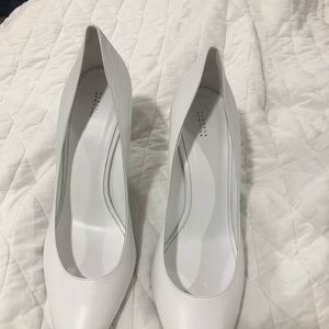 Brand new never worn white pumps